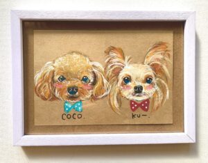 2匹の猫の顔が１枚に