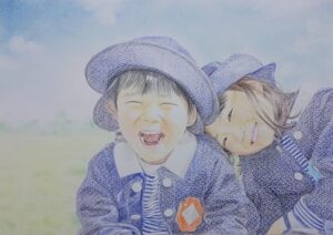 玄関先で卒園を記念して撮られた写真