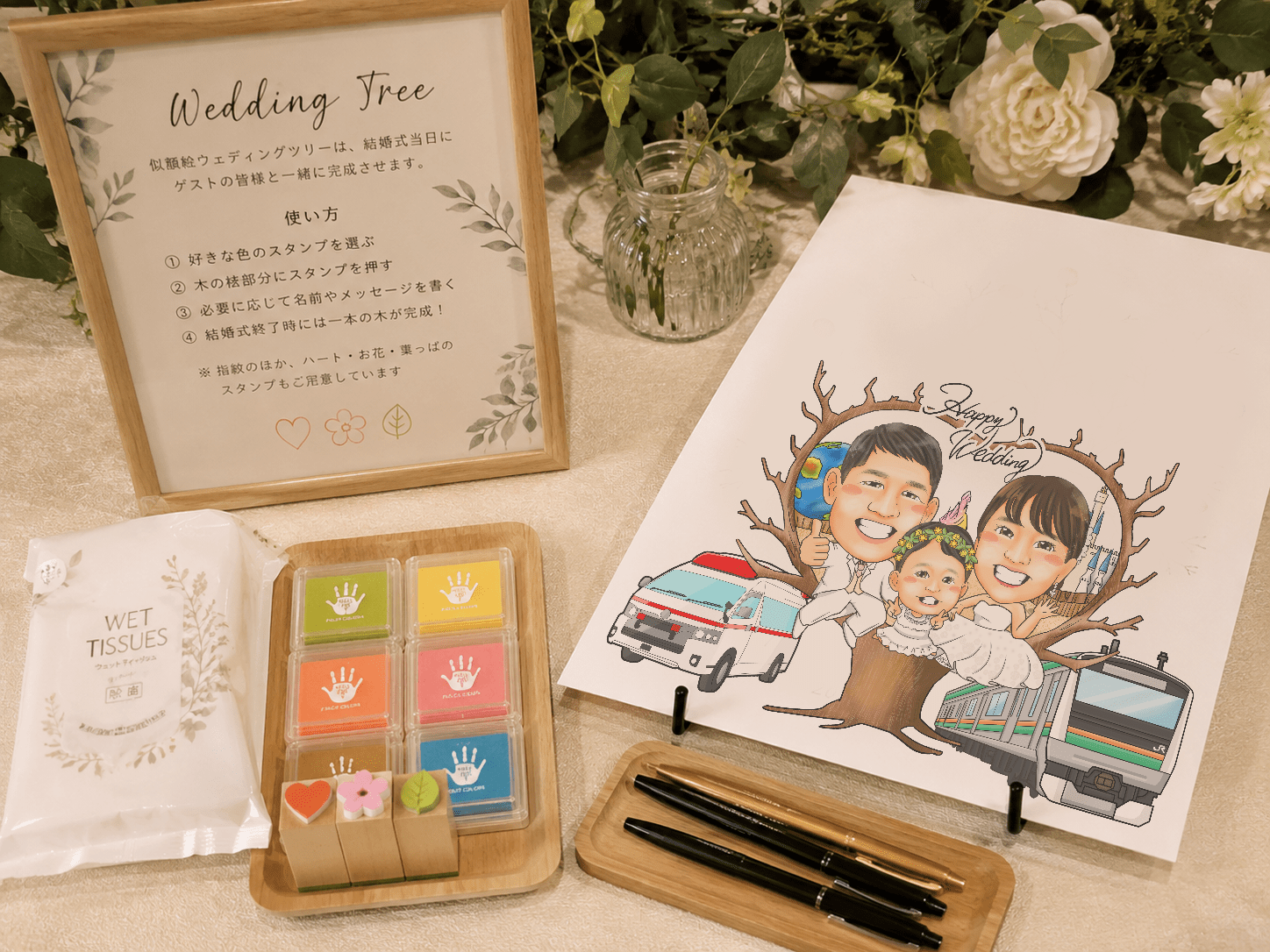 似顔絵ウェディングツリーはゲストの指紋やスタンプで、少しずつ完成していきます。