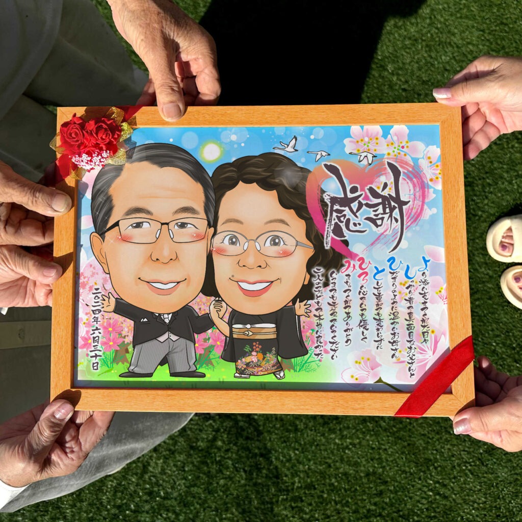 青空と舞う桜に包まれた両親の似顔絵
