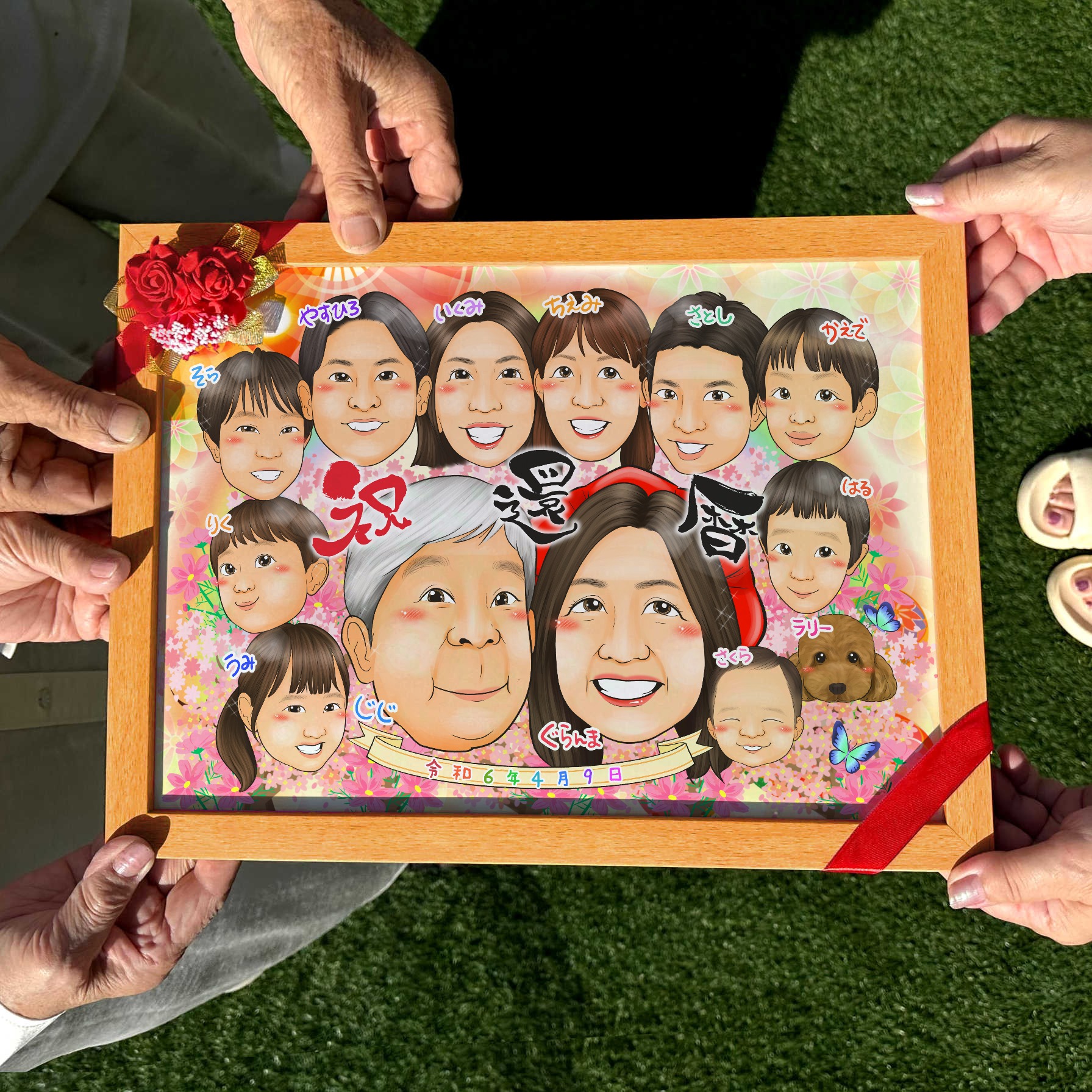 還暦祝いの主役夫婦を中心に親族一同が笑顔で並ぶ大人数の似顔絵ギフト