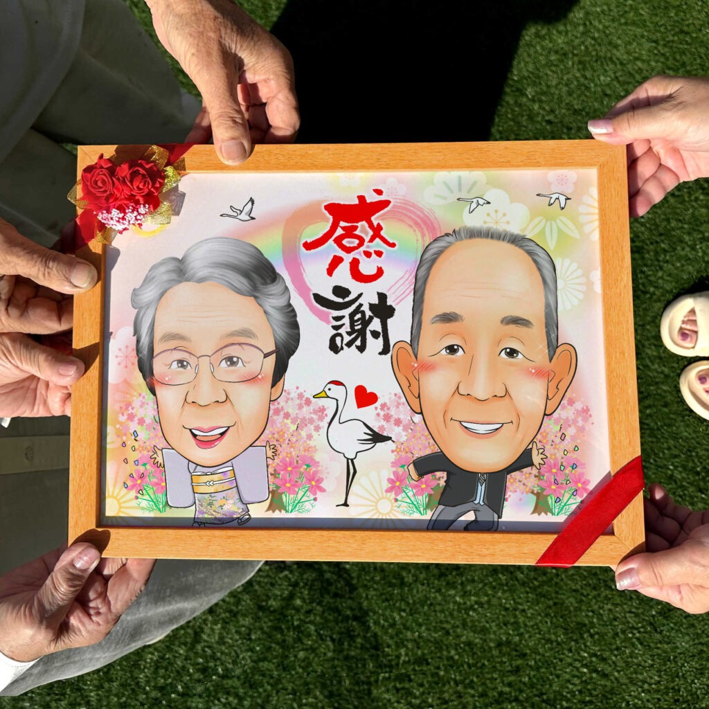 淡い桜色で包まれた両親への似顔絵
